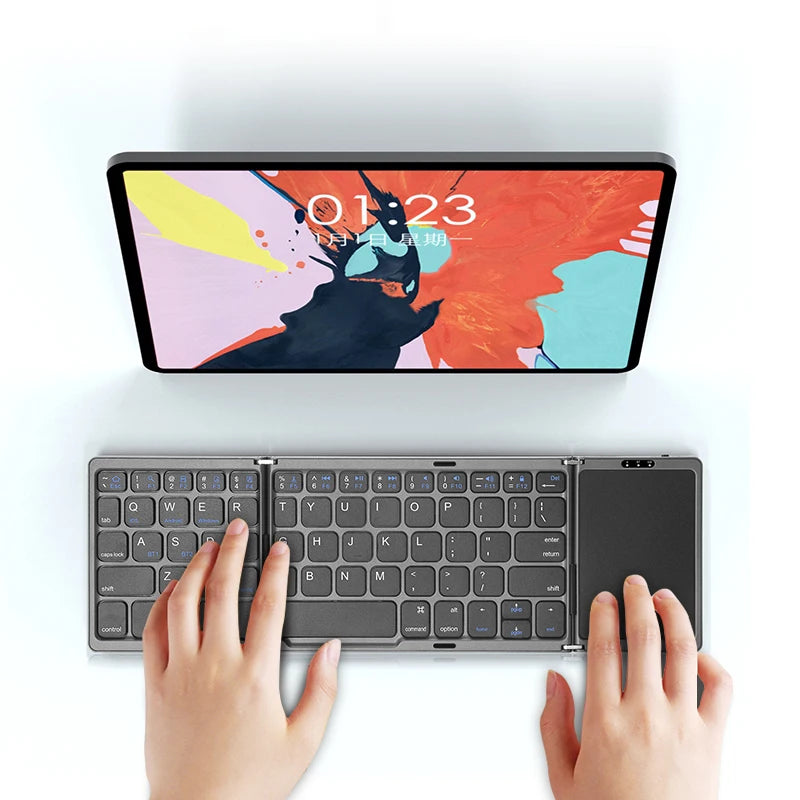 FoldKey Pro folded pocket-size — fits in shirt pocket